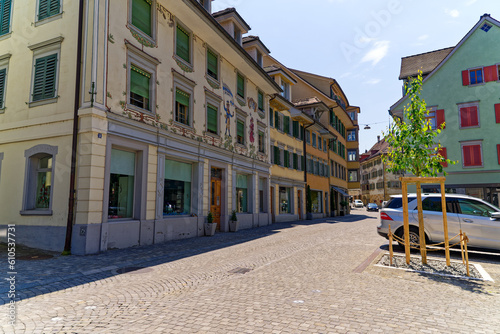 Scenic view of facades of historic houses at the old town of Swiss City of Zug on a sunny spring day. Photo taken May 22nd, 2023, Zug, Switzerland.