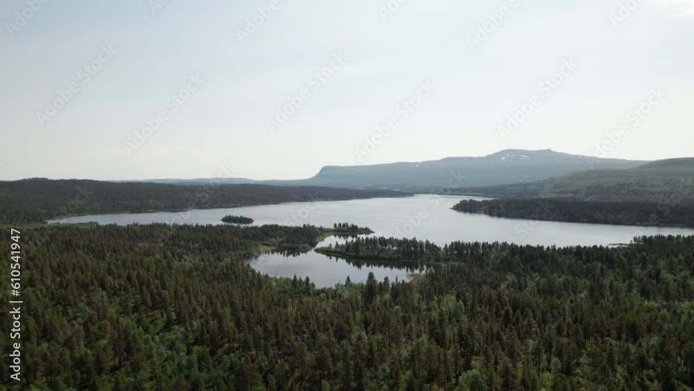 Stunning Aerial View of Serene Forest and Lake Landscape in Summer in Northern Sweden, Lapland, Kungsleden Trail, Jakkvikk Stunning Aerial View of Serene Forest and Lake Landscape in Summer in Northern Sweden, Lapland, Kungsleden Trail, Jakkvikk