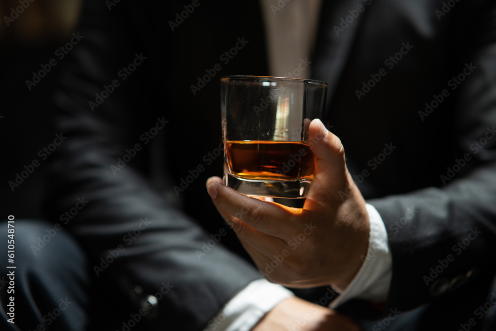 Businessmen in suits drinking Celebrate whiskey Businessmen in suits drinking Celebrate whiskey