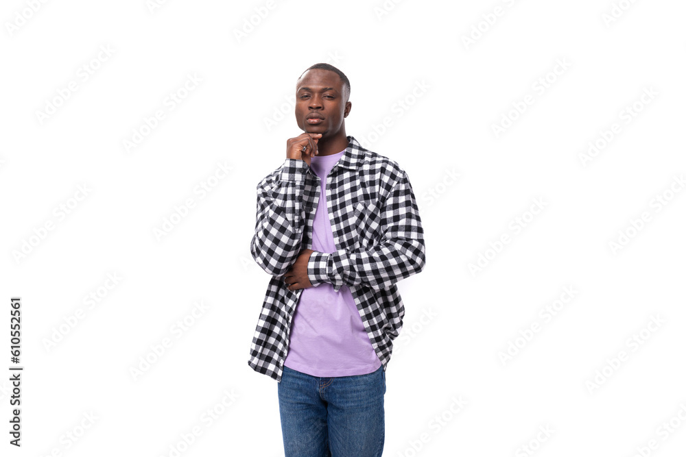 stylish young american guy with short haircut dressed casually on white background with copy space stylish young american guy with short haircut dressed casually on white background with copy space