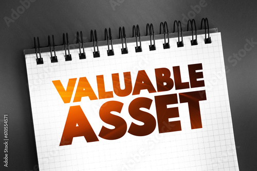Valuable Asset text on notepad, concept background photo