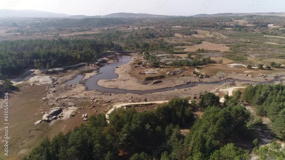 Aerial shot of a reservoir with low water levels Aerial shot of a reservoir with low water levels