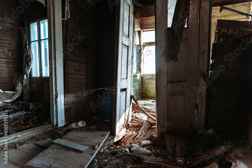 Abandoned Old House.broken door.Home Improvement Needed.Interior in need of repair and renovation.The entire interior is collapsed. © ARVD73