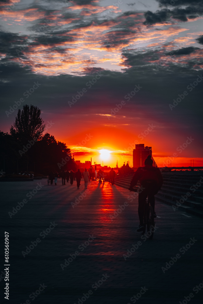 Beautiful view of the city of Dnipro during sunset or sunrise. Ukrainian city. The lights of a sun. Calm nature copies the space background. Beautiful view of the city of Dnipro during sunset or sunrise. Ukrainian city. The lights of a sun. Calm nature copies the space background.