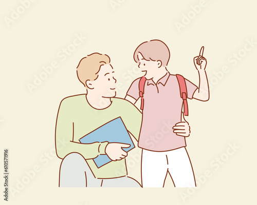 A father and his cute son looking at one another while talking. Hand drawn style vector design illustrations.