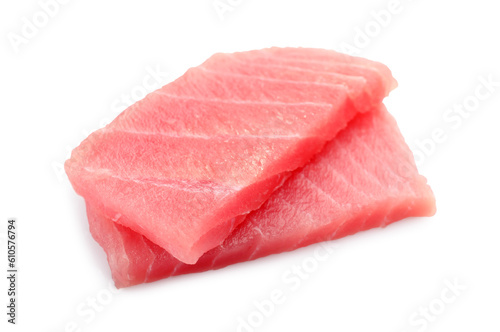Tasty sashimi (pieces of fresh raw tuna) on white background