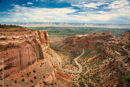 Colorado National Monument preserves one of the grand landscapes of the American West. curvy highway in the valley