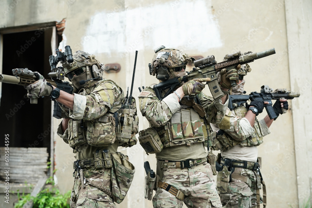 Fototapeta premium Military Soldiers Storming the Enemy Building