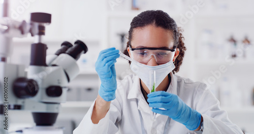 Lab worker, woman scientist and plant chemical pour of employee with science work. Laboratory mask, medical test and chemistry for botany and ecology analysis doing futuristic research with sprout