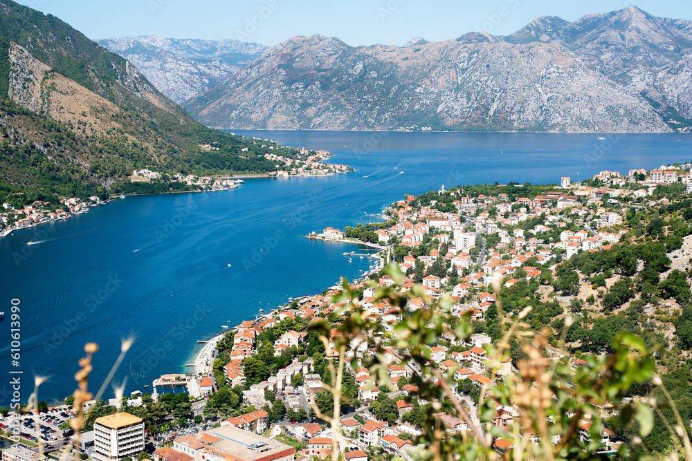 View of the beautiful Kotor bay from Lovcen Mountain on a summer sunny day. Montenegro. Selective focus.