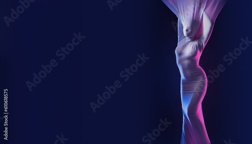 Woman is wrapped in cloth. Naked woman is entangled in white material. Beautiful background with slender woman. Elegant background for fashion magazine. Girl wrapped in cloth. Background for banner.