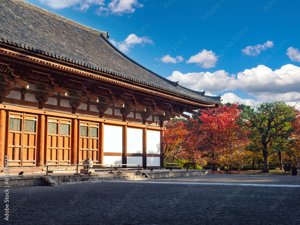 Fototapeta premium Japanese architecture. City of Kyoto. Ancient Japanese temple. Asian style building. Architectural landmark of Japan. Autumn trees near building. Kyoto in sunny weather. Temple building in Kyoto
