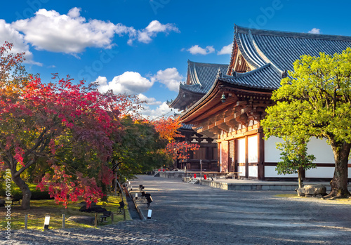 Landmarks Japan. Architecture of Kyoto. Ancient buildings in buddhist style. Japanese temples with blue sky. National landmarks of Japan. Kyoto in sunny weather. Excursions in Kyoto. Travel in Japan