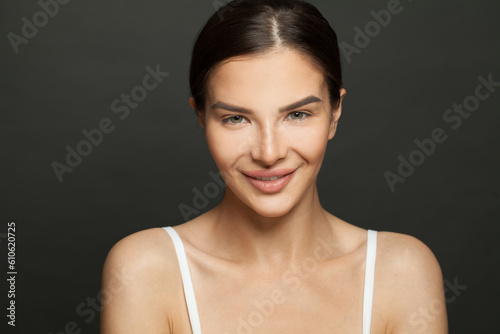 Perfect female face. Young woman with healthy clean skin closeup portrait