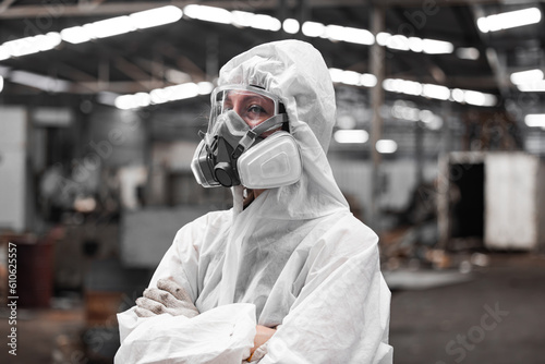 Industrial waste inspector wearing personal protective equipment to check hazardous chemicals, radioactive and toxic substances. Analyzing impact of factory's current projects, suggesting solutions. © SpaceOak