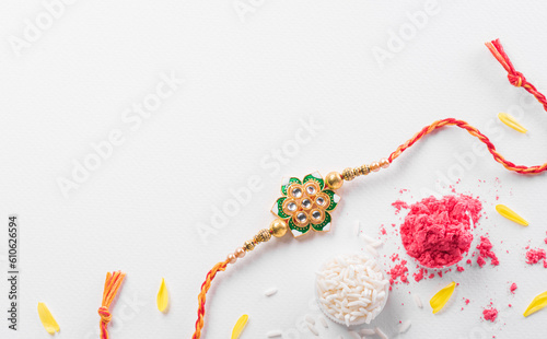 Tableau sur toile Raksha Bandhan, Indian festival with beautiful Rakhi and Rice Grains