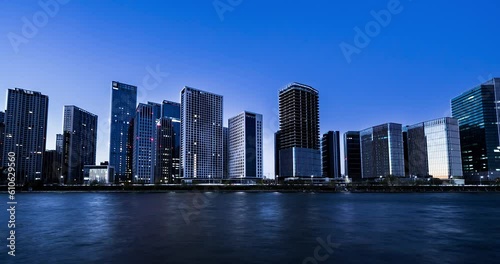 the grand canal, tongzhou, beijing, peking, china modern reflex urban scenery architecture city urban landscape urban skyline skyscraper business cbd architectural complex sunrise inverted reflection  photo