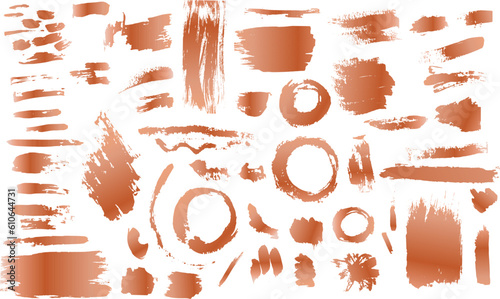 A Set of grunge copper, rose gold artistic brush strokes features sponge stamps, splashes, dry brush marks, and pastel pencil textures
