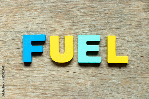 Wallpaper Mural Color alphabet letter in word fuel on wood background Torontodigital.ca