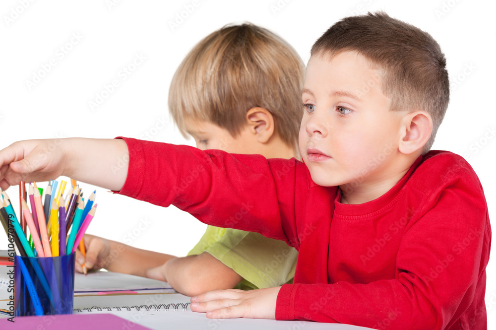 Two School Children Drawing on Notebooks Two School Children Drawing on Notebooks