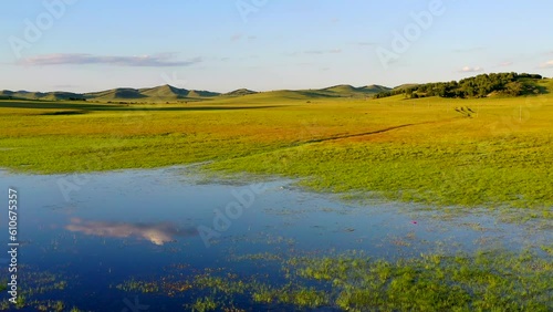 Inner Mongolia grassland Wild Duck Lake sunset in China。