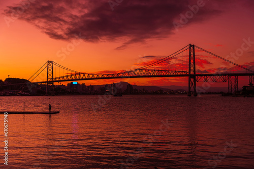 Hercilio luz bridge and warm sunset with colorful sky in Florianopolis