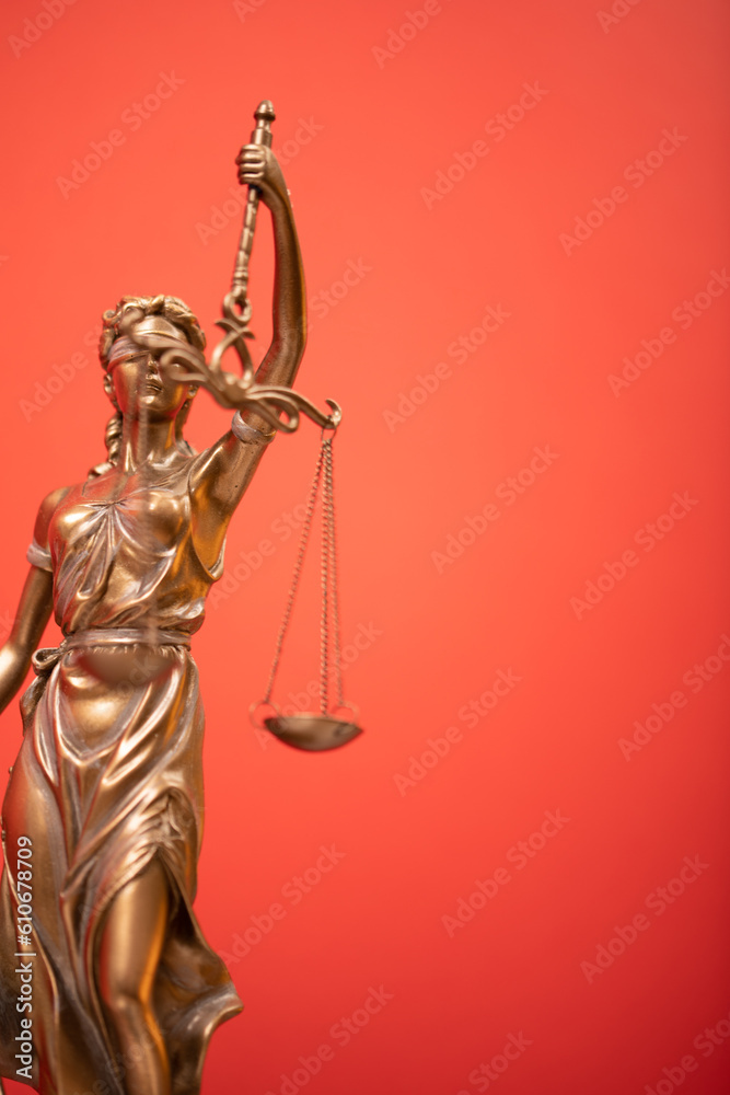 Fototapeta premium Bronze statue of the Goddess of Justice Themis, holding the Law Scales in her hands,
