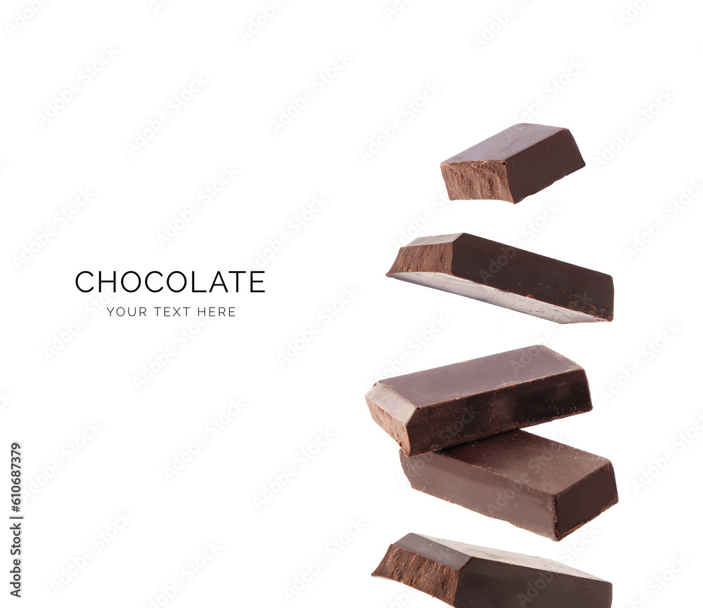 Creative layout made of dark chocolate on the white background. Flat lay. Food concept. Sweet chocolate.