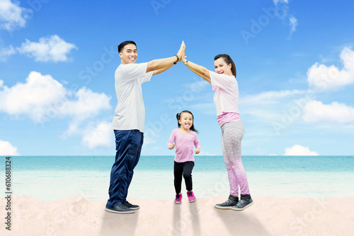 A family enjoys a happy beach vacation together