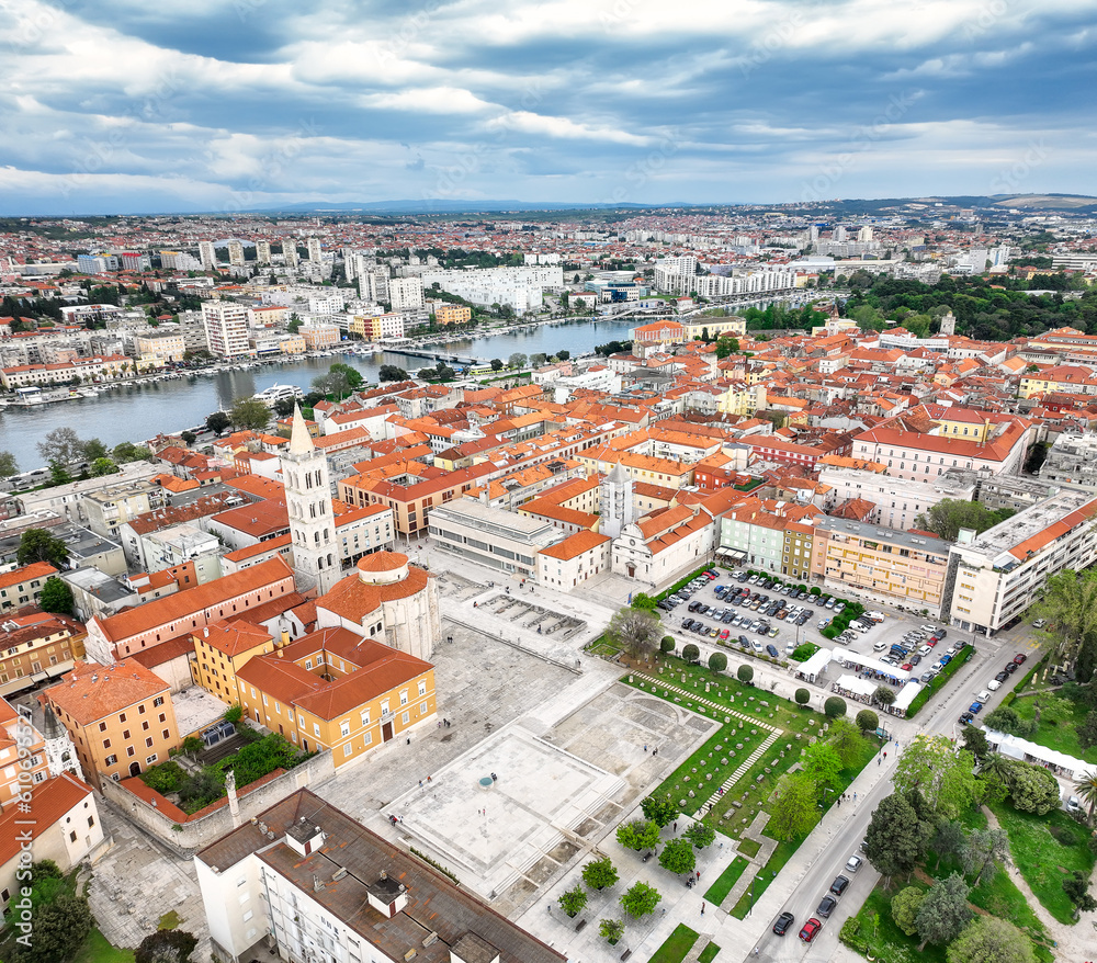 Amazing panoramic view of the famous city of Zadar in Croatia, old town, houses with red roofs, historical buildings surrounded by turquoise sea