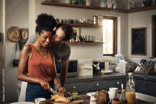 Fotografia Interracial couple, kiss and cooking in kitchen for morning breakfast, love or caring relationship at home