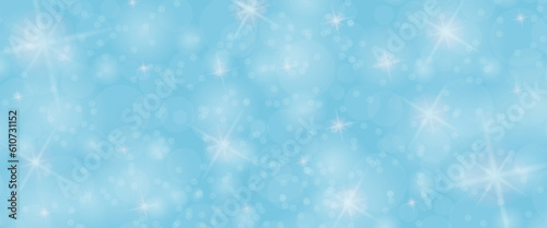 Blue background with bokeh elements and twinkling stars for postcards, banners, greetings and creative design