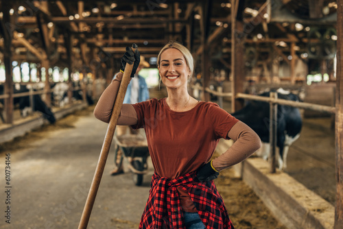 Принти на полотні Portrait of a countrywoman working in a barn.