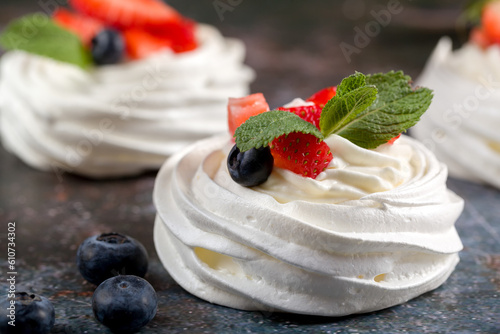 The process of making Pavlova dessert