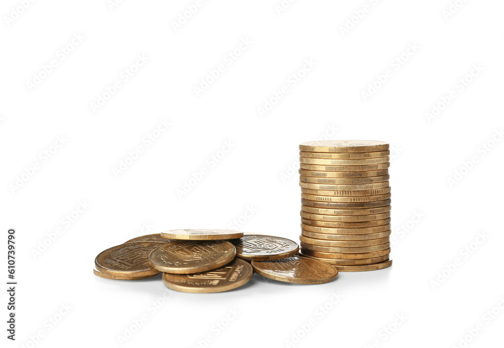 Stack and heap of coins isolated on white background Stack and heap of coins isolated on white background