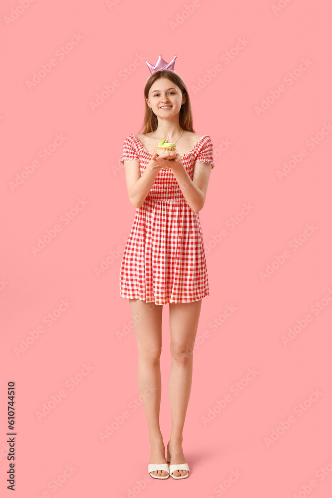 Pretty young woman with birthday cake on pink background Pretty young woman with birthday cake on pink background