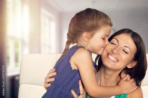 Mother's day concept. Child daughter and young mother