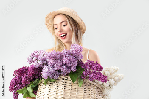 Young woman with basket of ...