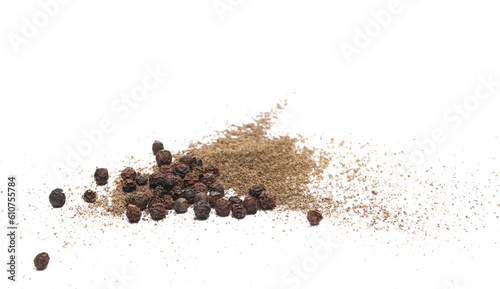 Minced black pepper and grains, ground peppercorn pile isolated on white, side view photo