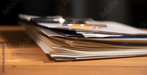 .Stack of business report paper file on modern white office desk