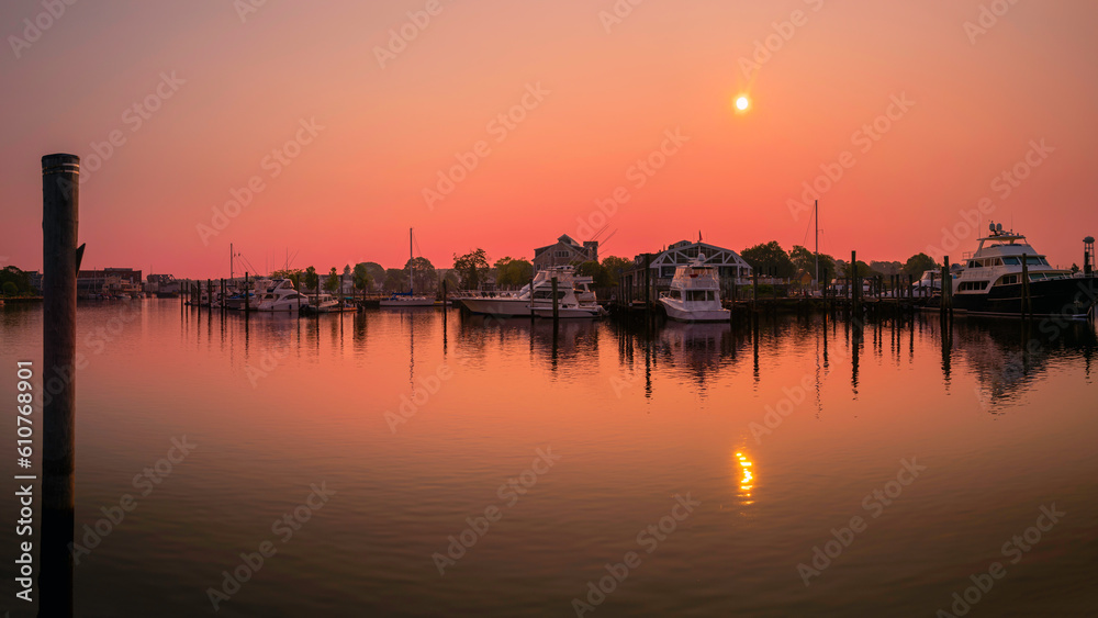 Sunrise and wildfire smoke over the Mystic River marina in Connecticut