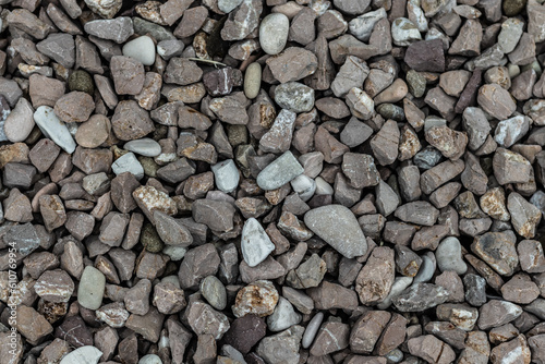 Texture of gravel scattered on the ground