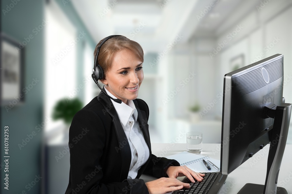 Business woman works in call center with headset, Business woman works in call center with headset,