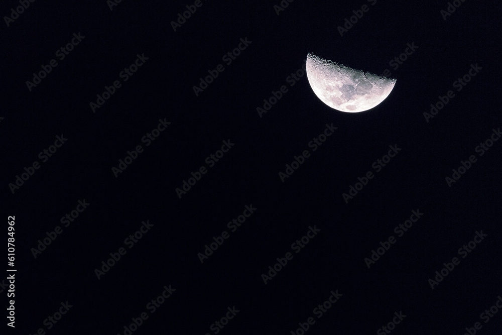 half moon in the dark black night sky half moon in the dark black night sky