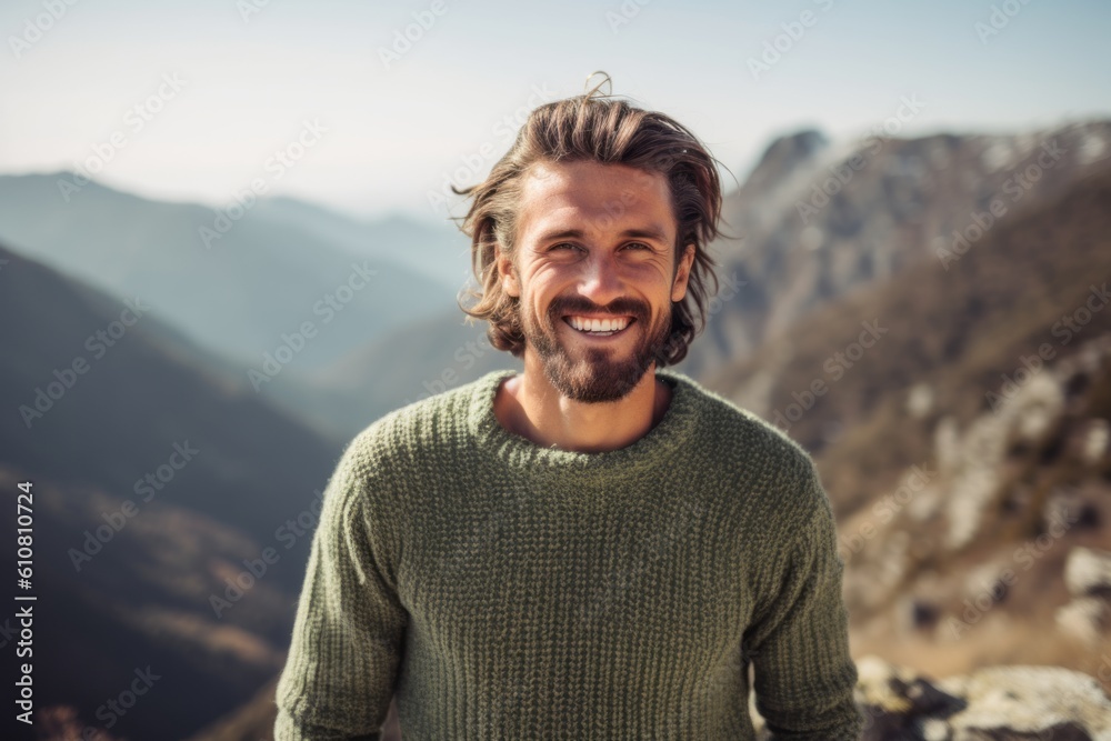 Medium shot portrait photography of a grinning man in his 30s that is wearing a cozy sweater against a scenic mountain hike with breathtaking views background . Generative AI Medium shot portrait photography of a grinning man in his 30s that is wearing a cozy sweater against a scenic mountain hike with breathtaking views background . Generative AI