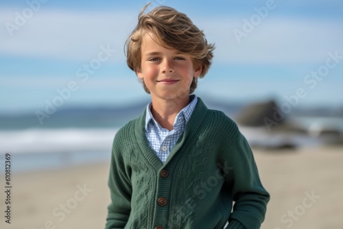 Portrait of a cute young boy at the beach on a sunny day