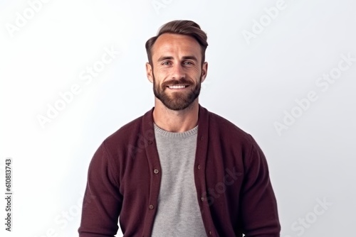 Medium shot portrait photography of a satisfied man in his 30s that is wearing a chic cardigan against a white background .  Generative AI