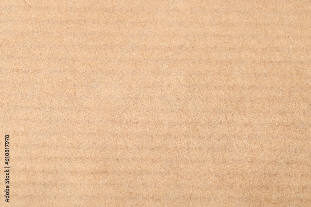 Fototapeta premium Texture of beige paper sheet as background, top view