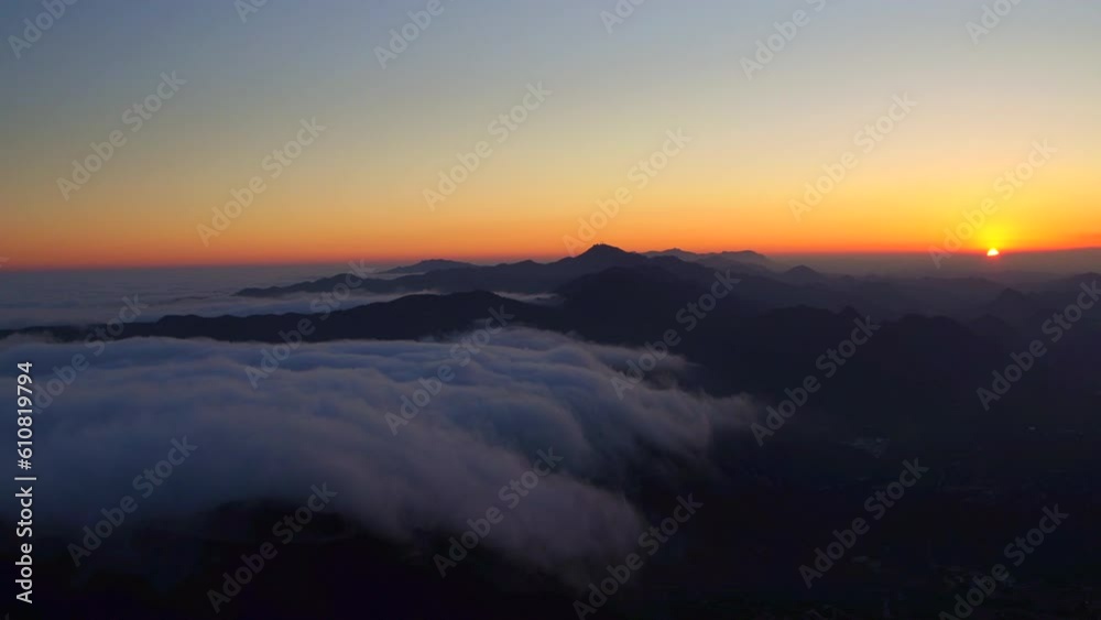 Aerial Shot Of Silhouette Mountain Range With Clouds Against Orange Sky, Drone Flying Over Natural Landscape - Napa Valley, California Aerial Shot Of Silhouette Mountain Range With Clouds Against Orange Sky, Drone Flying Over Natural Landscape - Napa Valley, California