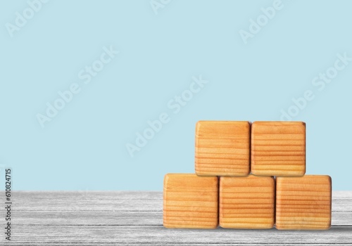 Fototapeta Naklejka Na Ścianę i Meble -  Set of wooden cubes blocks on the desk